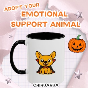 May include: A white ceramic mug with a black handle and interior, featuring a cartoon Chihuahua in a vampire costume. The mug has text that reads "ADOPT YOUR EMOTIONAL SUPPORT ANIMAL" and "CHIHUAHUA - VAMPIRE HALLOWEEN EDITION-". A jack-o'-lantern is also shown.