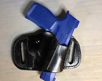 Holster, Semiauto Black Modern, Outside the Waistband, Small of the Back, or Side Carry.
