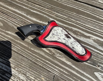 CMSA mounted shooting holster. Hair-on-hide.