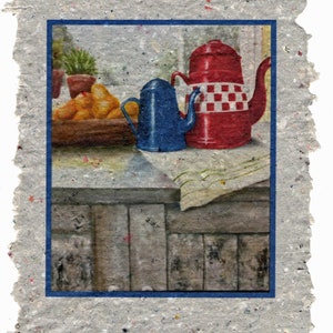 May include: Two teapots, one red with white checkered design and one blue, sitting on a wooden surface with a white tablecloth.