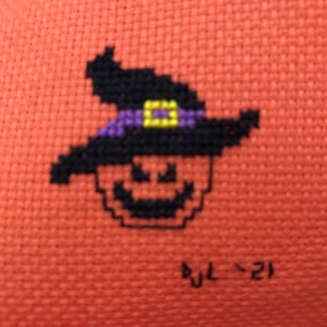 Completed Hand-Stitched Needlework: A Witchy Little Jack-O’-Lantern