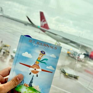 Cuaderno de bitácora de viaje para niños en avión