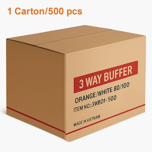 Puede incluir: Una caja de cartón marrón con ribetes y texto rojos. La caja dice "3 WAY BUFFER" en un rectángulo rojo, con "ORANGE/WHITE 80/100" y "ITEM NO.:3WB01-500" debajo. El texto "MADE IN VIETNAM" está en la parte inferior.