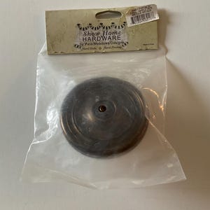 May include: Antique bronze finish ripple plate hardware by Pate-Meadows Designs. Show Home Hardware. Hard Made. Hand Finished. Made in China.