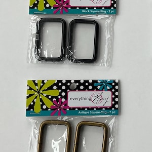 May include: Two packs of square rings in the image. One pack contains black rings, and the other contains antique-colored rings. The packaging has a colorful design with the text "everything Mary".