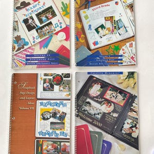 May include: Four spiral bound notebooks with colorful covers featuring scrapbook page design and layout ideas. The covers feature images of birthday parties, school children, marching band, and a wedding. The titles of the notebooks are "Happy Birthday!", "Third Grade", "Scrapbook Page Design and Layout Ideas", and "Welcome 2000".