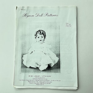 May include: A black and white doll pattern for a 15 inch doll called "Little Hilda". The pattern includes instructions for making a dress, bonnet, undergarments, and a doll mold. The pattern is copyright 1982 by Byron Molds.