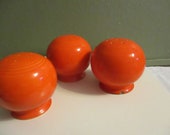 Fiesta Salt Pepper shakers Orange Vintage set of 2 Plus 1