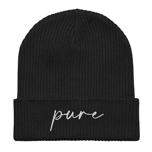 May include: Black knitted beanie with a white embroidered "pure" on the front.