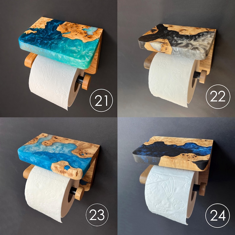 May include: Four wall-mounted toilet paper holders featuring a wooden shelf with embedded colored resin. Each unit includes a horizontal rod for a roll of toilet paper. The resin colors include bright blue, grey, light blue, and dark blue.