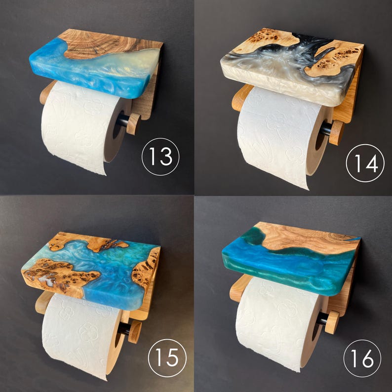 May include: Four wall-mounted toilet paper holders featuring a wooden shelf with embedded resin in shades of blue, grey, and teal. Each unit includes a wooden dowel arm and a cylindrical end cap to secure a roll of white toilet paper.