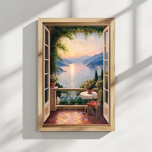 Op de afbeelding: Een schilderij van een balkon met uitzicht op een meer met bergen in de verte. Het balkon heeft een tafel en een stoel met een potplant op de tafel. De lucht is in levendige oranje en roze tinten.