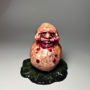 Grotesque Flesh Creature Sculpture – Macabre Art on Mossy Rock – Unique Handmade Horror Decor