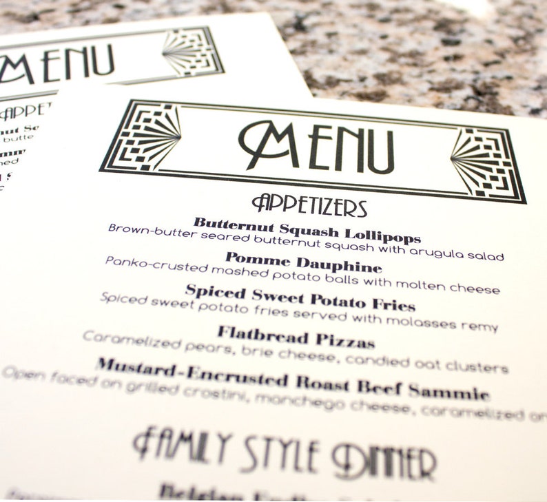 May include: A black and white menu with the word "MENU" in a decorative font at the top. The menu lists appetizers, including Butternut Squash Lollipops, Pomme Dauphine, Spiced Sweet Potato Fries, Flatbread Pizzas, and Mustard-Encrusted Roast Beef Sammie. The menu also includes a section for Family Style Dinner.