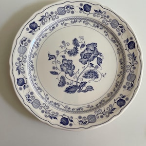 Plato vintage de cerámica con trébol de cuatro hojas, fabricado en Italia.