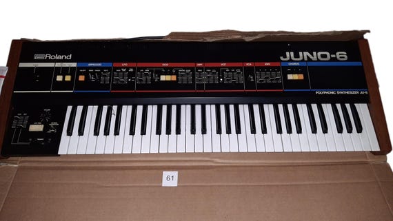 Roland JUNO-6 Analog Keyboard Synthesizer (1982) – Vintage Polyphonic Synth with Original Manual