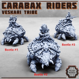 May include: Three gray resin miniature figures titled Carabax Riders Veskari Tribe. Each features a rider mounted on a large, armored beetle-like creature. The figures are labeled Beetle #1, Beetle #2, and Beetle #3, with a Print Minis logo included.