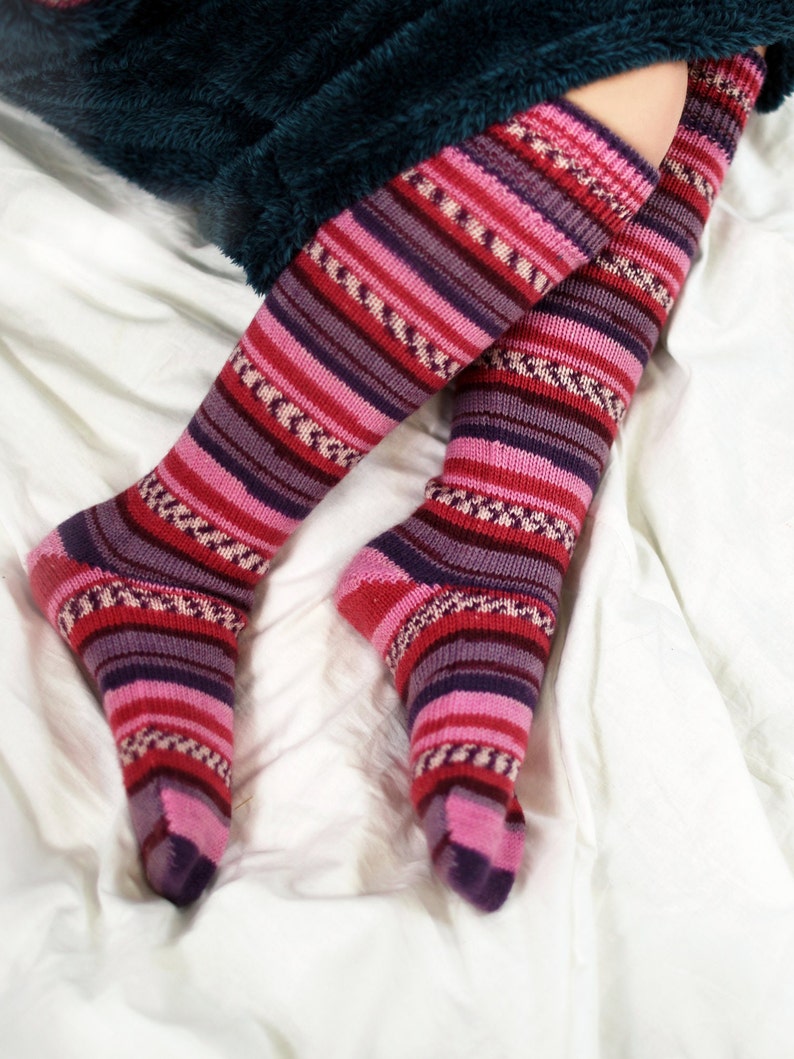 Long, durable woolen socks made from special yarn. Vibrant colors and lasting quality. Perfect gift for any occasion, packed in lovely packaging. Hand-knitted and warm. Available in 14 colors. Ideal for machine washing. Comfort and style combined.