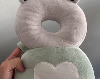 Mochila protectora para la cabeza Aby para caminar y gatear - Cojín de seguridad ajustable de felpa suave para niños pequeños, protección transpirable contra caídas de poliéster