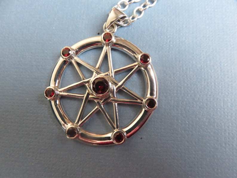 Sterling Silver Pendant by Peter Stone Elven Star Sterling Fairy Star Seven Pointed Star with Garnet