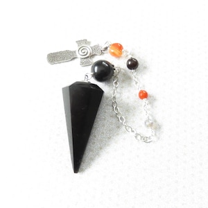 May include: A set of three ceramic mugs with a speckled, matte finish. The mugs are in shades of blue, green, and white. Each mug has a simple, modern design, perfect for coffee or tea.