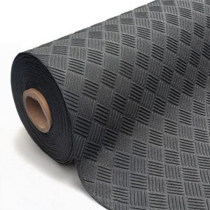 May include: A roll of black rubber matting with a textured, checkered pattern. The matting is rolled up, revealing the brown cardboard core. The surface has a repeating pattern of raised, rectangular shapes.