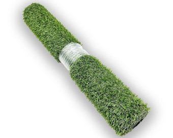 May include: A roll of artificial grass featuring vibrant green synthetic blades with a textured appearance. The cylindrical roll is secured in the center with a band of clear plastic film, maintaining its compact shape for storage or transport.