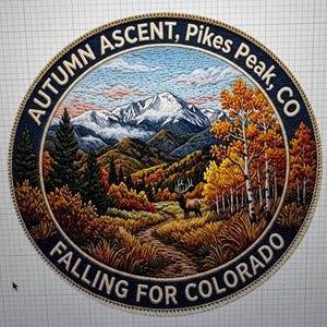 May include: A circular embroidered patch featuring a mountain landscape with snow-capped peaks, an elk in a golden meadow, and autumn trees. The dark blue border contains the text "AUTUMN ASCENT, PIKES PEAK, CO" and "FALLING FOR COLORADO".
