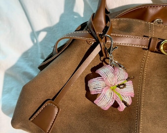 Handmade Beaded Lily Keychain – Resin-Coated Glass Bead Bag Charm