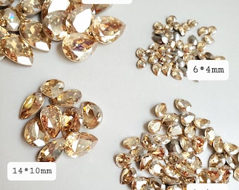 Pietre Swarovski 4320 Golden Shadow a forma di pera, con retro appuntito