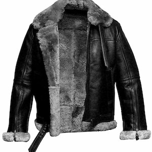 May include: A black leather jacket with a shearling lining. The jacket has a zipper closure and a stand-up collar.