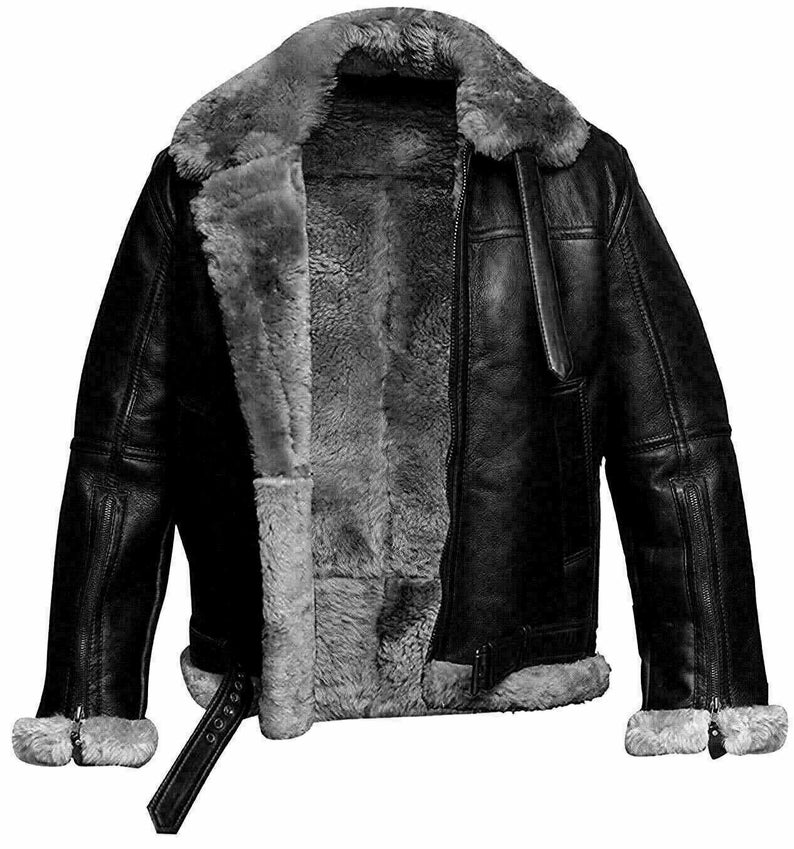May include: A black leather jacket with a shearling lining. The jacket has a zipper closure and a stand-up collar.