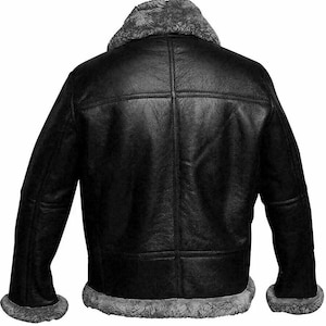 May include: A black leather jacket with a shearling collar and lining. The jacket has a zipper closure and multiple pockets.