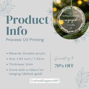 May include: A circular clear acrylic ornament featuring a white printed floral wreath design, the text SOPHIA & DANIEL, engaged, and the date 11.16.2026. The ornament measures 2.93 inches in diameter and 2mm in thickness, hanging from a gold ribbon.