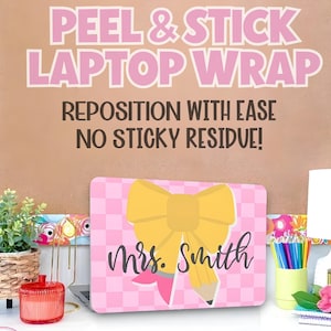 May include: A pink and white checkered laptop wrap with a yellow bow and pencil design, personalized with "Mrs. Smith." The background features text that reads "Peel & Stick Laptop Wrap" and "Reposition with Ease, No Sticky Residue!"