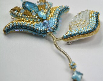 Large embroidered beaded brooch in the shape of a blue flower
