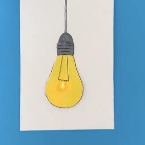 Plantilla de "bombilla de papel" de Moonshotkidz e instrucciones para tarjetas interactivas Electrónica de papel Proyecto de arte tecnológico fácil y divertido DIY STEAM