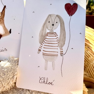 Carte de naissance/voeux en aquarelle lapinou. Personnalisable pour le prénom, à renseigner dans la personnalisation.