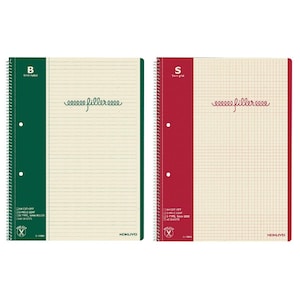 May include: Two spiral-bound notebooks. One has a green cover with the letter "B" and lined pages. The other has a red cover with the letter "S" and grid pages. Both notebooks have the text "eeeeee fillereece" and are labeled "KOKUYO".