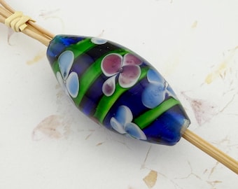 Handcrafted Cobalt Blue Pendant with Green Swirled Design and Floating Blossoms