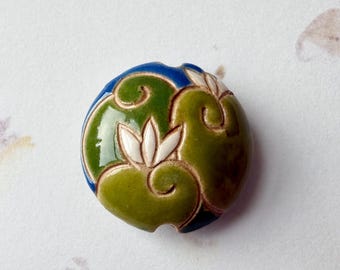 White Lotus on Green, 23mm Lentil Shaped Bead, Large Hole Bead