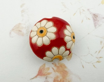 White Daisies on a Red Background, Lentil Shaped Bead