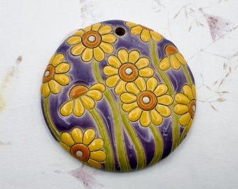 Large Round Daisy Pendant With Lilac Glazec Background and Yellow and Orange Daisies, Focal Bead, Pendant Bead, Golem Studio Designs