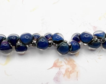 Evening Sky Unicorne Beads, Boro Teardrops, 25 Beads Per Strand, Shades of Blue, Purple and Plum with Crystal