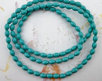 Turquoise Blue Oval Pressed Rice Beads, 6x4mm