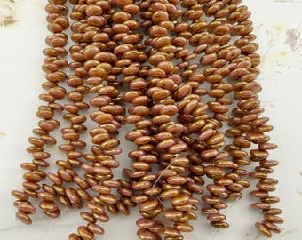 6mm Opaque Rose Gold Topaz Luster, Lentil Shaped Beads, 50 Pieces Per Strand