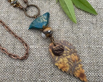 A Little Bird Told Me, 26 Inch Over the Head Necklace, A Sweet Polymer Clay Bird Bead and Disk with a Mixed Media Leaf Pendant