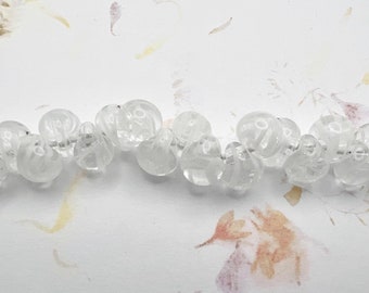 White Chocolate, Unicorne Beads, Boro Teardrops, 25 Beads Per Strand, Exotic Series Mix, Ribbons Of White Through Clear Glass