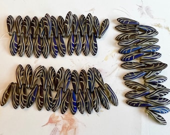 Medium  Dagger Beads, Laser Etched Yellow Transparent Wing Design, (25 pcs)