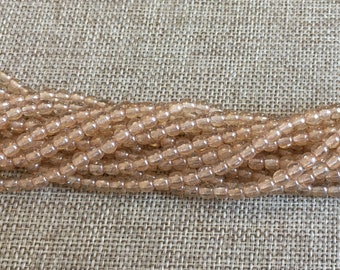 4mm Round Druk Beads, Transparent Champagne Luster, 100 Beads Per Strand, Featured Starman Czech Glass Bead For The 2019 Toho Challenge